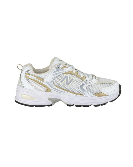 Immagine di NEW BALANCE 530 - Sneaker da donna bianca, grigia e oro con intersuola ABZORB - MR530RD