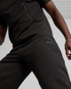 Immagine di PUMA - PANTALONE DA UOMO NERO PUMATECH TRACK PANT - 624388-01