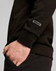 Immagine di PUMA - FELPA RAD/CAL CREW DA UOMO NERA - 681618-01