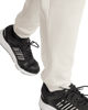 Immagine di ADIDAS - PANTALONE FEELCOZY PANT PANNA DA UOMO - JH1039