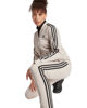Immagine di ADIDAS - TUTA 3S TR TS BEIGE E NERA - IJ8786
