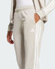 Immagine di ADIDAS - TUTA COMPLETA BEIGE E BIANCA TR TS T.U. DA DONNA - JD2686