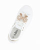Immagine di MISS GLOBO - Scarpa bianca con fiocco in strass e patch posteriore oro