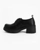 Immagine di MISS GLOBO - Scarpa nera con suola track e cinturino con fibbia frontale, tacco 5,5CM