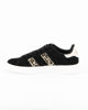 Immagine di RIFLE - Scarpa sneakers nera da donna con lacci e inserti maculati