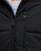 Immagine di JACK & JONES - PIUMINO NERO DA UOMO IDROREPELLENTE CON CAPPUCCIO