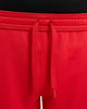 Immagine di NIKE - Pantaloni corti da bambino rossi in tessuto traspirante con logo bianco