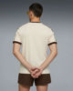 Immagine di PUMA - T-SHIRT UOMO MEZZA MANICA  BEIGE E MARRONE T7 BIG CAT RINGER TEE AL.SNOW, 635242-87