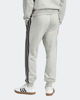 Immagine di ADIDAS - PANTALONI TUTA DA UOMO GRIGI  ESSENTIALS 3 - STRIPES FELPATI -  JD1862