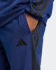 Immagine di ADIDAS -  TUTA UOMO BLU CON 3 BANDE NERE ESSENTIALS 3-STRIPES -KB7657