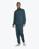 Immagine di ADIDAS -  TUTA UOMO VERDE PETROLIO CON 3 BANDE NERE ESSENTIALS 3-STRIPES -JX5502