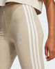Immagine di ADIDAS - LEGGINGS DONNA BEIGE 3S SJ LEG CON BANDE BIANCHE - JE0073