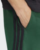 Immagine di ADIDAS - PANTALONCINO UOMO VERDE CON BANDE NERE SINGLE JERSEY 7 POLLICI -  JF3680