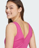 Immagine di ADIDAS - CANOTTA CORTA DONNA FUXIA ESSENTIALS SMALL LOGO -JP4792