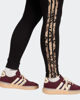 Immagine di ADIDAS - LEGGINGS DONNA NERI E MARRONI ESSENTIAL ANIMAL PRINT- JM1864
