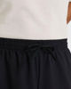 Immagine di NEW BALANCE - PANTALONCINO UOMO NERO E CELESTE ESSENTIALS LINED GRAPHIC - MS41238BM
