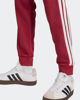 Immagine di ADIDAS - PANTALONE ESSENTIAL ROSSO DA UOMO 3 STRISCE - KR2702