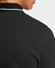 Immagine di ADIDAS - POLO NERA MEZZA MANICA DA UOMO CON RIGHINO SUL COLLETTO - JE9023
