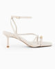 Immagine di MISS GLOBO - Sandalo infradito avorio con sottopiede in memory foam, punta quadrata e dettaglio metallico infra-alluce, tacco 6CM