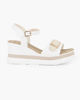 Immagine di MISS GLOBO - Sandalo platform bianco/panna con fibbia sulla fascia anteriore e sottopiede in memory soft, zeppa 7CM