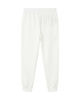 Immagine di PUMA -PANTALONE DA RAGAZZA (7 - 16 ANNI) ESS RHINESTONE , BIANCO E LOGO FRONTALE IN STRASS, 693858-02