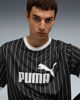 Immagine di PUMA - T-SHIRT NERA A RIGHE BIANCA  ESSENTIAL STRIPED JSY  DA UOMO, 688263-01