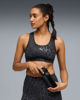 Immagine di PUMA - REGGISENO SPORTIVO MACULATO NERO E GRIGIO 4KEEPS BRA SPOTTED HAZE MID   DA DONNA, 528511-01