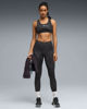 Immagine di PUMA - REGGISENO SPORTIVO MACULATO NERO E GRIGIO 4KEEPS BRA SPOTTED HAZE MID   DA DONNA, 528511-01