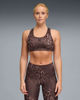 Immagine di PUMA - REGGISENO SPORTIVO MACULATO MARRONE E NERO 4KEEPS BRA SPOTTED HAZE MID   DA DONNA, 528511-13