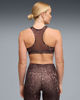 Immagine di PUMA - REGGISENO SPORTIVO MACULATO MARRONE E NERO 4KEEPS BRA SPOTTED HAZE MID   DA DONNA, 528511-13