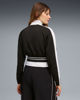 Immagine di PUMA -FELPA NERA E BIANCA FULL ZIPRELAXED CROPPED TRACK DA DONNA, 634556-01