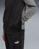 Immagine di PUMA - TUTA COMPLETA NERA E GRIGIA COLORBLOCK POLY SUIT  DA UOMO, 691766-01