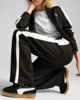 Immagine di PUMA - PANTALONE T7 ALWAYS ON NERO CON BANDA BIANCHE DA DONNA,  629797-01