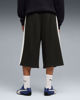 Immagine di PUMA - PANTALONE TUTA 3/4 NERO CON BANDE BIANCHE T7 RELAXED - DA UOMO, 635359-01