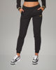 Immagine di PUMA - TUTA COMPLETA NERA ESSENTIAL+ GLITTER FZ SUIT FL  DA DONNA ,  684764-01