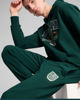 Immagine di PUMA - PANTALONE TUTA  VERDE SPORTS LEGACY GRAPHIC DA UOMO, 629631-60