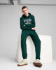 Immagine di PUMA - PANTALONE TUTA  VERDE SPORTS LEGACY GRAPHIC DA UOMO, 629631-60