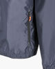 Immagine di WAIKIKI RUN- K-WAY CON CAPPUCCIO FULL ZIP  UOMO  BLU SCURO CON DETTAGLI ARANCIONI FLUO - VERANO