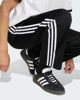 Immagine di ADIDAS - PANTALONE TUTA FIREBIRD TP NERO CON DETTAGLI BIANCHI DA UOMO, KD8315