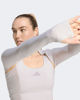 Immagine di ADIDAS - COPRISPALLE DA ALLENAMENTO PRIMELIFT ESSENTIALS CONTOUR GRIGIO ROSATO DA DONNA - KD2217