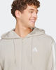 Immagine di ADIDAS -FELPA CON CAPPUCCIO FULL ZIP 3S FT FZ HD GRIGIA DA UOMO, JE6340
