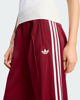 Immagine di ADIDAS -PANTALONE TUTA FIREBIRD CLASSIC  ROSSO SCURO CON DETTAGLI BIANCHI DA DONNA, KS4794