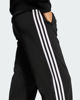 Immagine di ADIDAS -PANTALONE TUTA FIREBIRD CLASSIC NERO CON DETTAGLI BIANCHI DA DONNA, KD5575