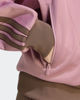 Immagine di ADIDAS -  GIACCA DA ALLENAMENTO FULL ZIP  ST FD TRACK TOP ROSA CON DETTAGLI MARRONI DA DONNA,  KV0601
