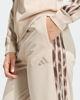 Immagine di ADIDAS - TUTA COMPLETA  FULL ZIP  BEIGE CON DETTAGLI ANIMALIER DA DONNA, KQ7620