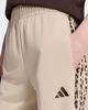 Immagine di ADIDAS - PANTALONE SEASONAL ESSENTIALS ANIMAL PRINT 3-STRIPES BEIGE CON DETTAGLI LEOPARDATI DA DONNA,  KH1543