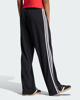 Immagine di ADIDAS -PANTALONE DA ALLENAMENTO GESSATI FIREBIRD NERO CON 3 BANDE BIANCHE DA DONNA, KS6787