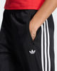 Immagine di ADIDAS -PANTALONE DA ALLENAMENTO GESSATI FIREBIRD NERO CON 3 BANDE BIANCHE DA DONNA, KS6787