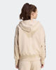 Immagine di ADIDAS - FELPA FULL ZIP CON CAPPUCCIO SEASONALS ANIMAL BEIGE CON DETTAGLI LEOPARDATI DA DONNA, KH1547