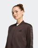 Immagine di ADIDAS -  TUTA COMPLETA FULL ZIP MARRONE CON DETTAGLI ANIMALIER  DA DONNA, KB8933